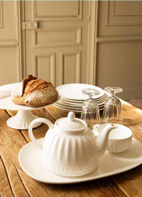 SERVITEUR EN PORCELAINE